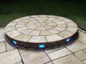 circular stone platform with blue lights